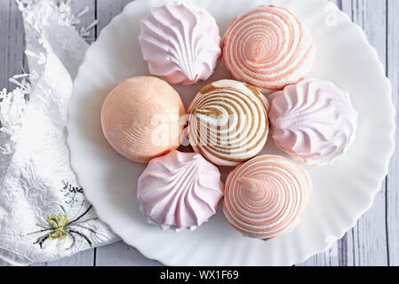 Marshmallows of different varieties on a plate. Stock Photo