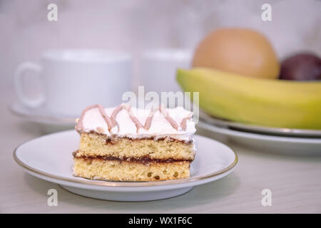 Delicious cake, tea and fruit. Stock Photo