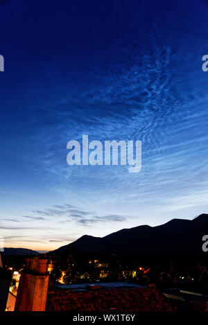 Noctilucent clouds over Skiddaw in the Lake District, Cumbria, UK Stock Photo