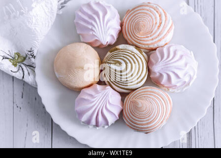 Marshmallows of different varieties on a plate. Stock Photo