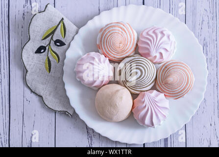 Marshmallows of different varieties on a plate. Stock Photo