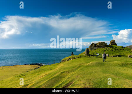 The remains of Duntulm Castle, Trotternish, Isle of Skye, Scotland, UK.  On the horizon are the Western Isles. Stock Photo