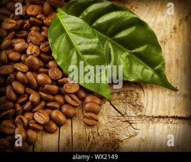 Coffee Beans over Wood Background Stock Photo