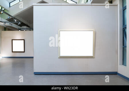 blank frames on exhibition wall in a room Stock Photo