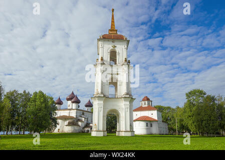 Old bell tower on the background of two Orthodox churches. Cathedral Square in the city of Kargopol. Arkhangelsk region, Russia Stock Photo