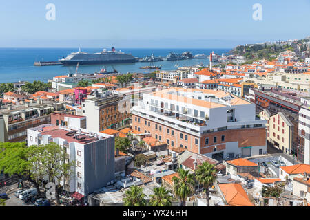 Aerial view of Portugese Funchal with a big cruise ship in the harbor Stock Photo