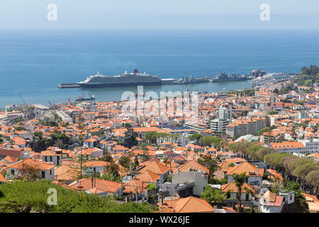 Aerial view of Portugese Funchal with a big cruise ship in the harbor Stock Photo