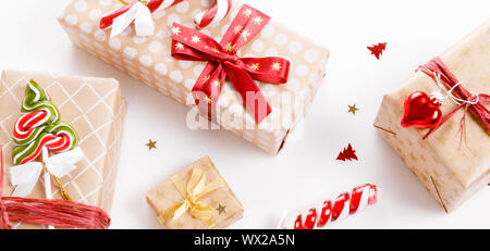 Christmas background, Christmas present red gifts box and decorating elements on white background. Stock Photo