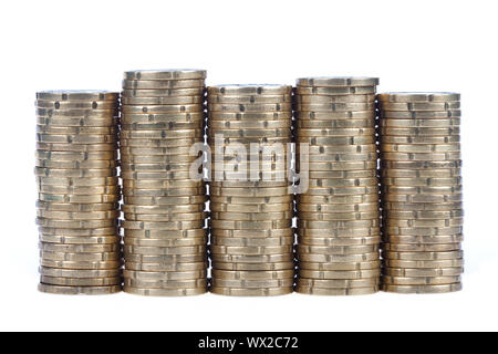 Piles of european 20 cent coins, isolated on a white background Stock Photo