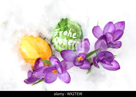 The picture shows a beautiful easter decoration with the german text happy easter Stock Photo