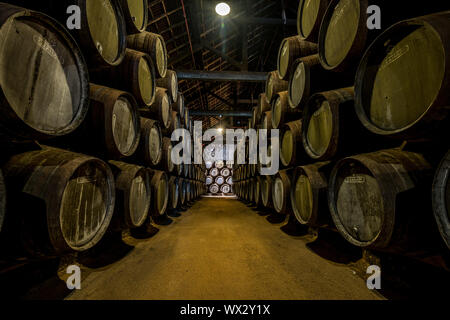 PORTO, PORTUGAL - June 19, 2018: Port wine barrels in Graham's port lodge, Vila Nova de Gaia, Porto, Portugal Stock Photo