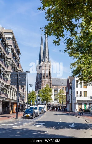 Tilburg Netherlands - September 10, 2019: Streetscene with Saint Joseph Church in the historic centre of Tilburg in Brabant Netherlands, Stock Photo