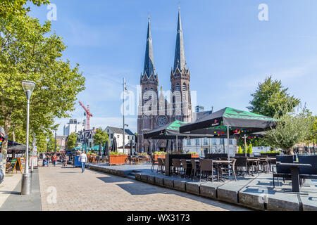 Tilburg Netherlands - September 10, 2019: Saint Joseph Church with terraces in front in the historic centre of Tilburg in Brabant Netherlands, Stock Photo