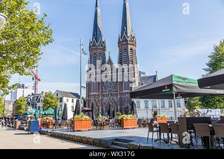 Tilburg Netherlands - September 10, 2019: Saint Joseph Church with terraces in front in the historic centre of Tilburg in Brabant Netherlands, Stock Photo