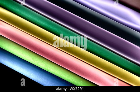 Folded sheets of paper in different colors. Stock Photo