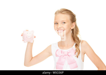 picture of lovely teenage girl with piggy bank Stock Photo