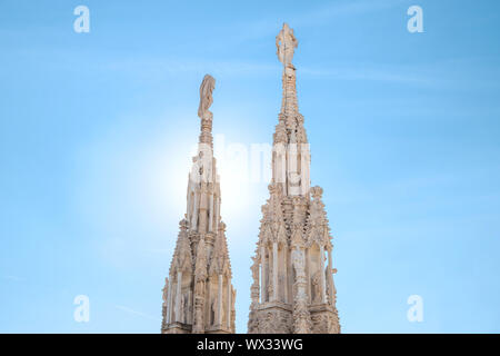 Marble statues - architecture on top of roof Duomo Stock Photo