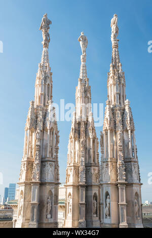 Marble statues - architecture on top of roof Duomo Stock Photo