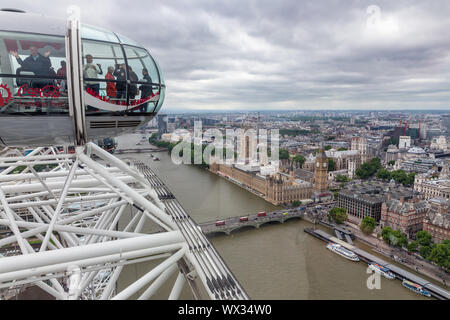 Tourists in cabin London Eye with aerial view London, England Stock Photo