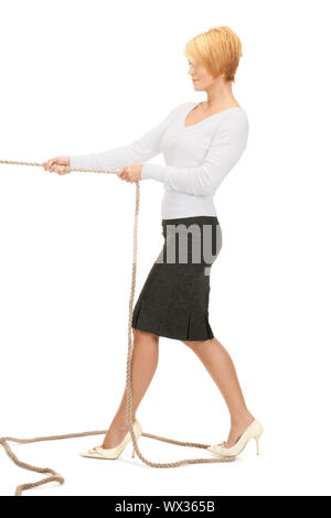 bright picture of business woman pulling rope Stock Photo - Alamy
