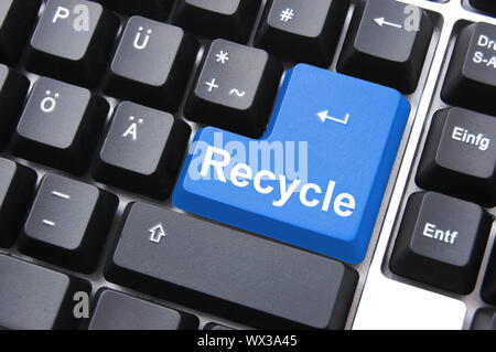 environmental protection with recycle button on keyboard Stock Photo
