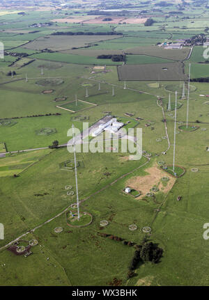 Inskip Masts An aerial view of radio masts in greenery field in North Downs Stock ...