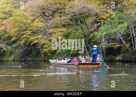 Geibikei Gorge River Cruises in Autumn foliage season. Beautiful scenery landscapes view in sunny weather day. Ichinoseki, Iwate Prefecture, Japan Stock Photo