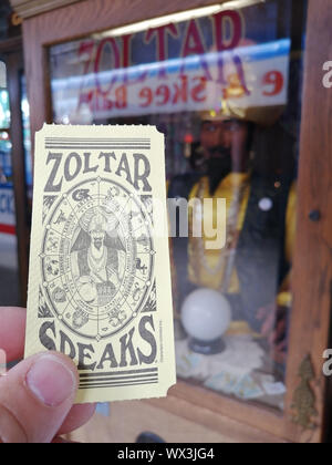 New York, USA - June 14th 2019: Zoltar genie fortune telling machine and horoscope card in Deno's Wonder Wheel Amusement Park, Conie Island Stock Photo