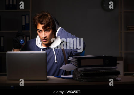 The thief trying to steal personal data in identity theft concept Stock Photo
