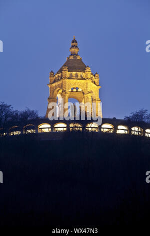 Illuminated Kaiser Wilhelm Monument at dusk, Porta Westfalica, East Westphalia, Germany, Europe Stock Photo