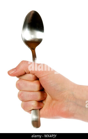 Spoon in Hand Stock Photo