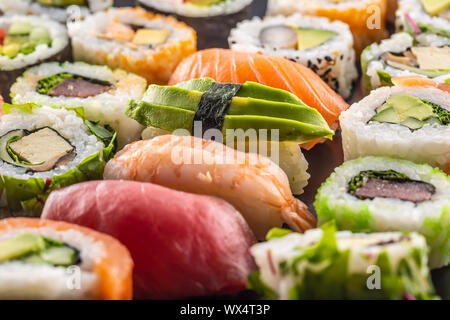 Assortment of japanese sushi rolls nigiri sashimi and maki Stock Photo