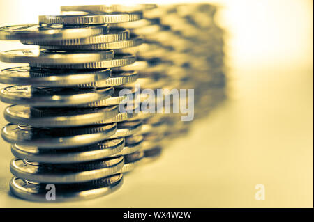 Stack of golden coins macro. Rows of coins for finance and banking concept. Economy trends background for business idea.