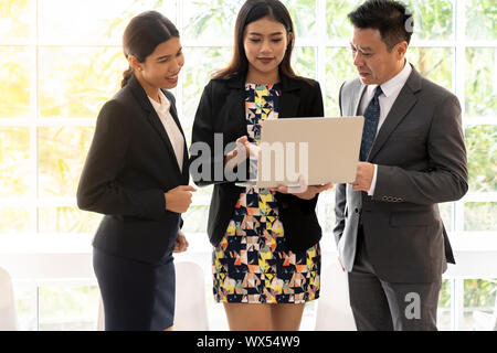 Business people talking at cafe window Stock Photo