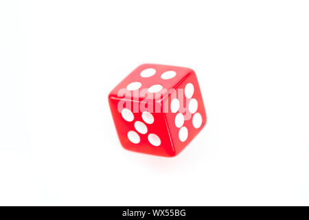 Red dice in motion against a white background Stock Photo