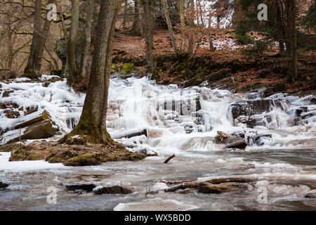 Pictures of the Selke waterfall in winter Harz Stock Photo