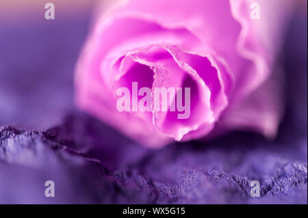 Multi-colored crumpled real vivid paper sheets texture background. Close up. Shallow depth of field. Stock Photo