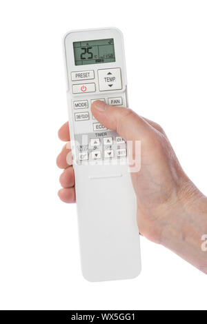 Remote control from air conditioner in hand Stock Photo