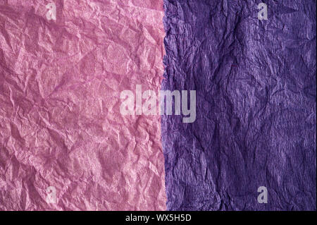 Multi-colored crumpled real vivid paper sheets texture background. Magenta, pink. Stock Photo