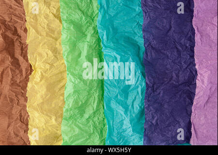 Multi-colored crumpled real vivid paper sheets texture background. Stock Photo