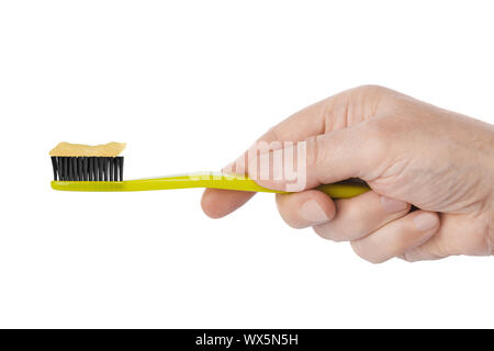 Hand with toothbrush Stock Photo