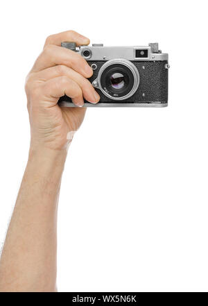 Vintage photo camera in hand Stock Photo