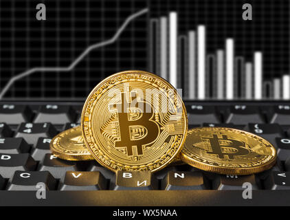 Bitcoins on computer and diagram - business background Stock Photo