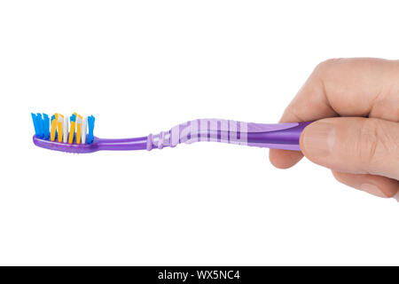 Hand with toothbrush Stock Photo