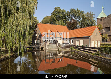 park and watergate of river Berkel and St Georg church, Vreden, Muensterland, Germany, Europe Stock Photo