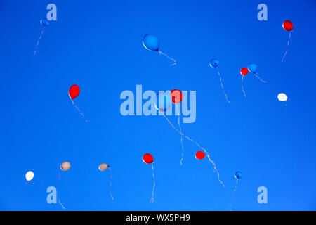 Balloons on a background of dark blue sky Stock Photo