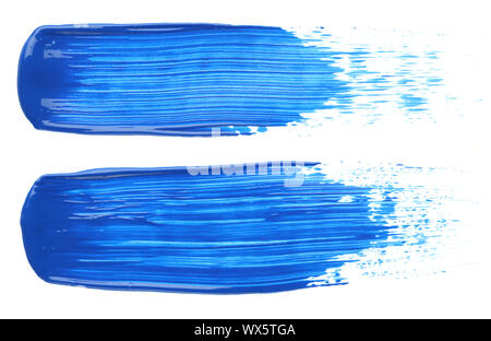 Two blue paint smears isolated on white Stock Photo