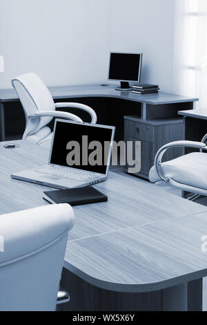 laptop on table at modern office Stock Photo