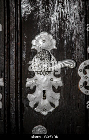 this is an antique rustic cast-iron doorknob Stock Photo