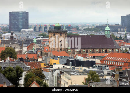 The skyline of Copenhagen, Denmark, with the Round Tower, Rundetaarn, and Trinitatis Church prominent Stock Photo